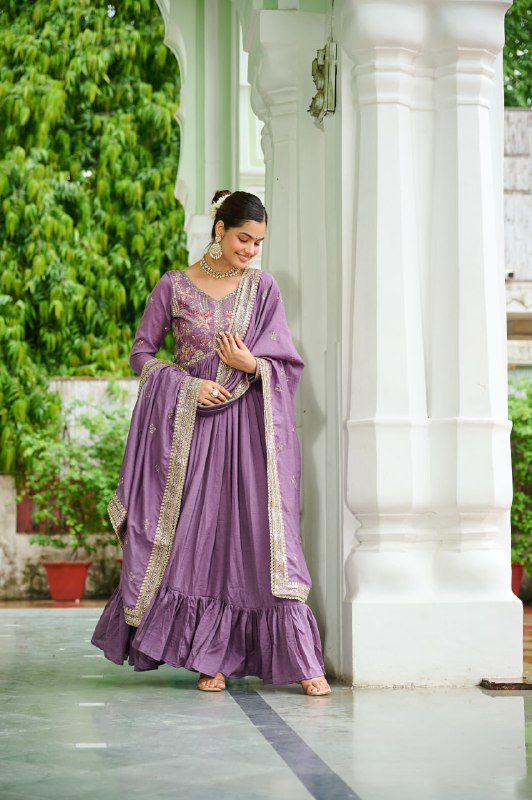 Celebrating the season in this stunning silk gown, beautifully paired with a dupatta