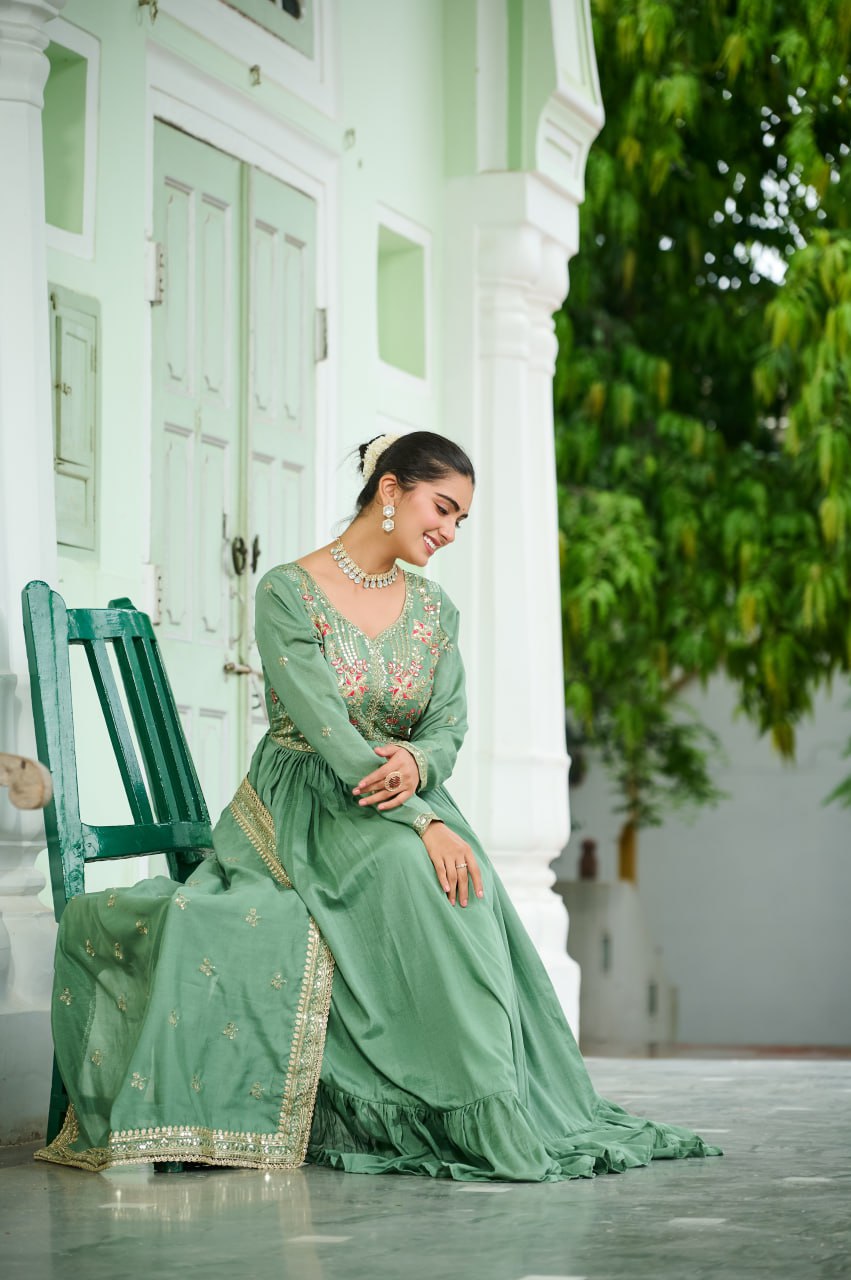 Celebrating the season in this stunning silk gown, beautifully paired with a dupatta